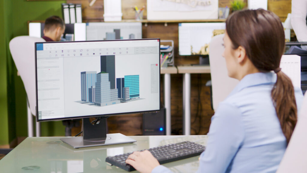 Architectural Rendering Trends Shaping the Future of Real Estate Marketing female architect making 3d building models on computer